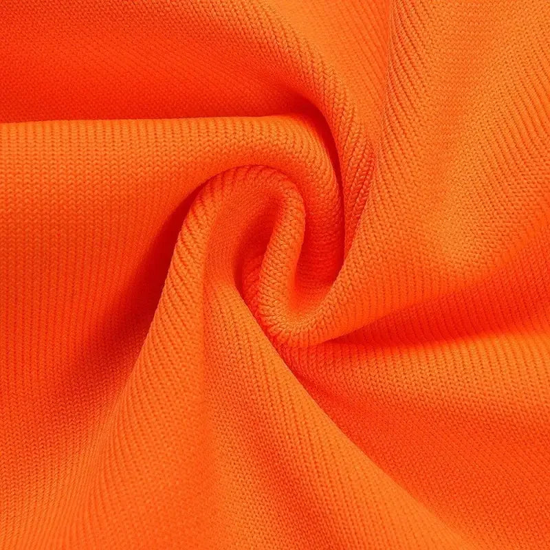 Bright orange textured fabric from the Tassel Orange Elegant Dress for a stylish look