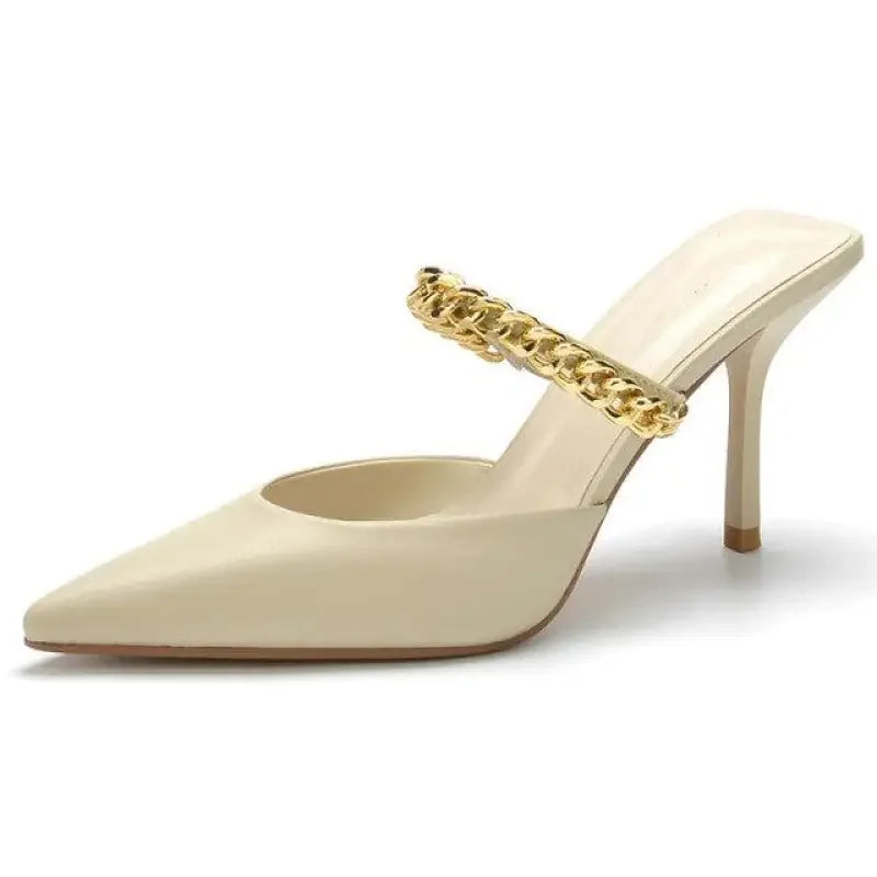 Beige pointed toe heels with gold chain on stylish mule design