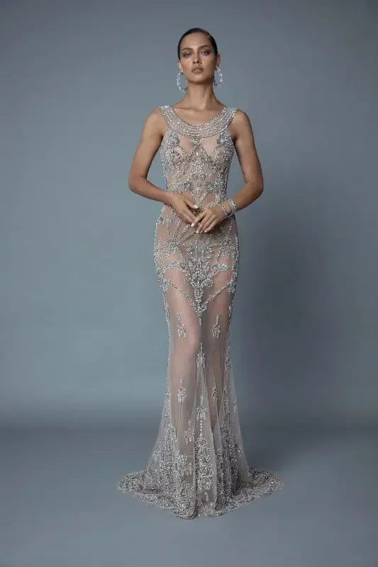 Glamorous evening dress featuring a sheer beaded gown for an elegant prom look
