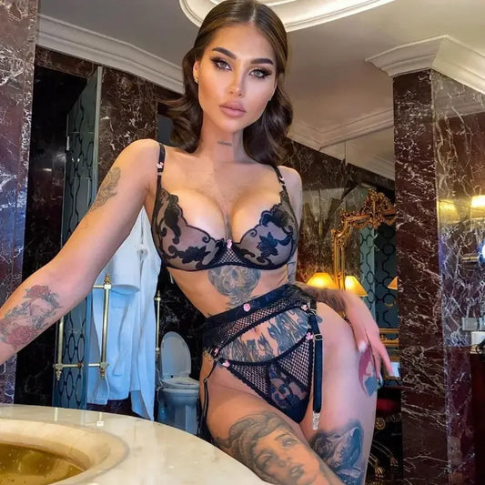 Elegant woman in black lingerie bodysuit from Luxury Transparent Set 3-Pieces, a hot lingerie option