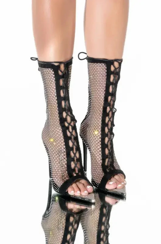 Black mesh peep-toe stiletto booties with eyelet rhinestone detailing for an eyelet rhinestone ankle look