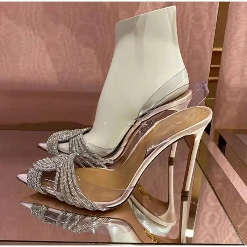 Elegant pointed toe crystal transparent pumps with high heels and crystal embellishments