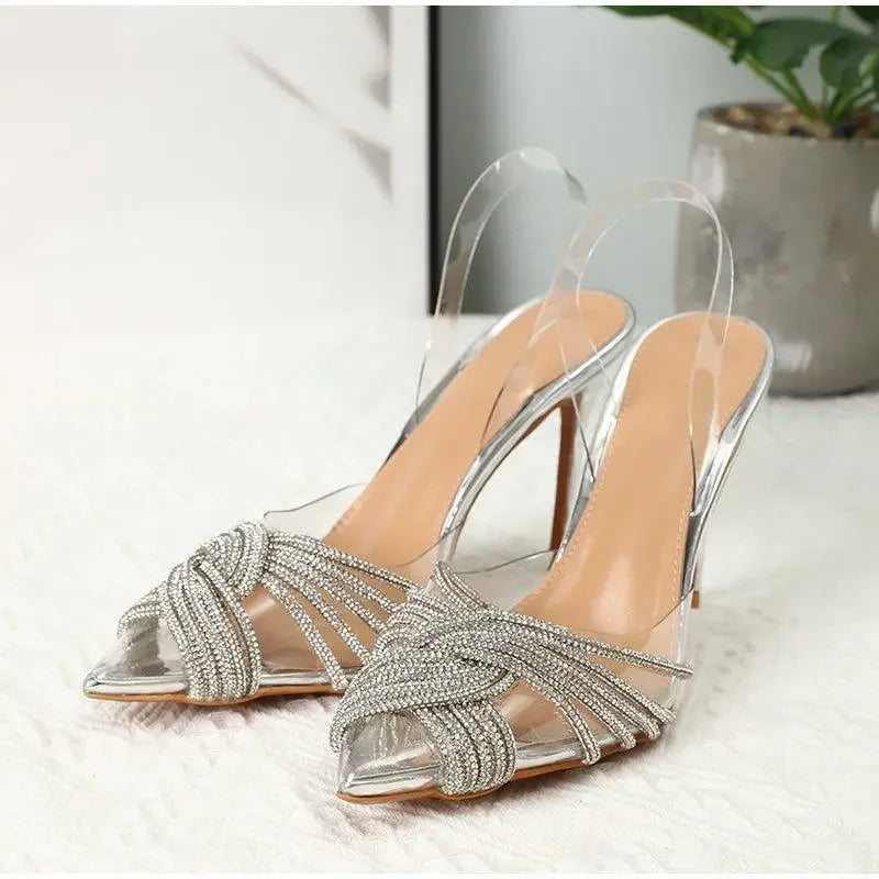 Silver pointed toe crystal transparent pumps with rhinestone embellishments for elegant style
