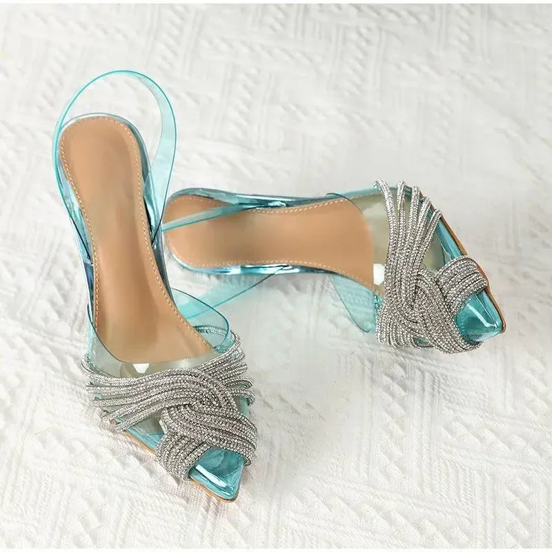 Turquoise high-heeled sandals with rhinestone straps featured in pointed toe crystal transparent pumps