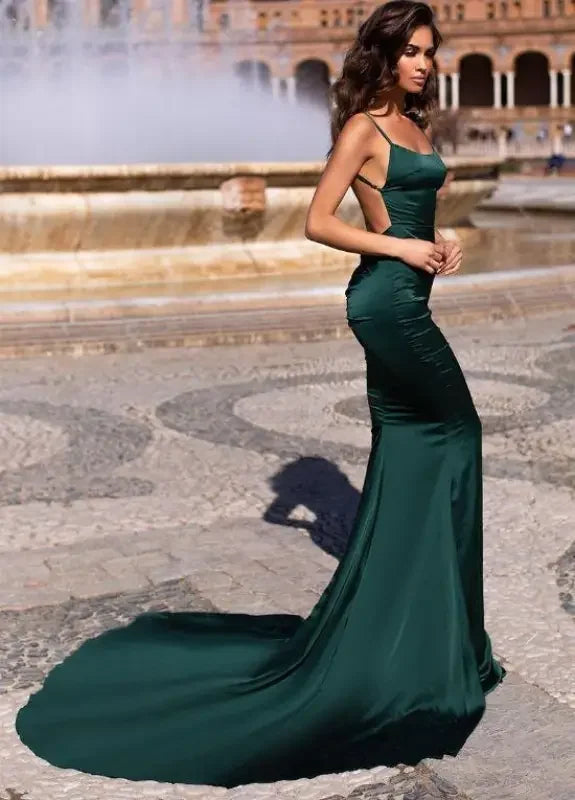 Elegant emerald green gown from the stunning stretch satin prom dress collection