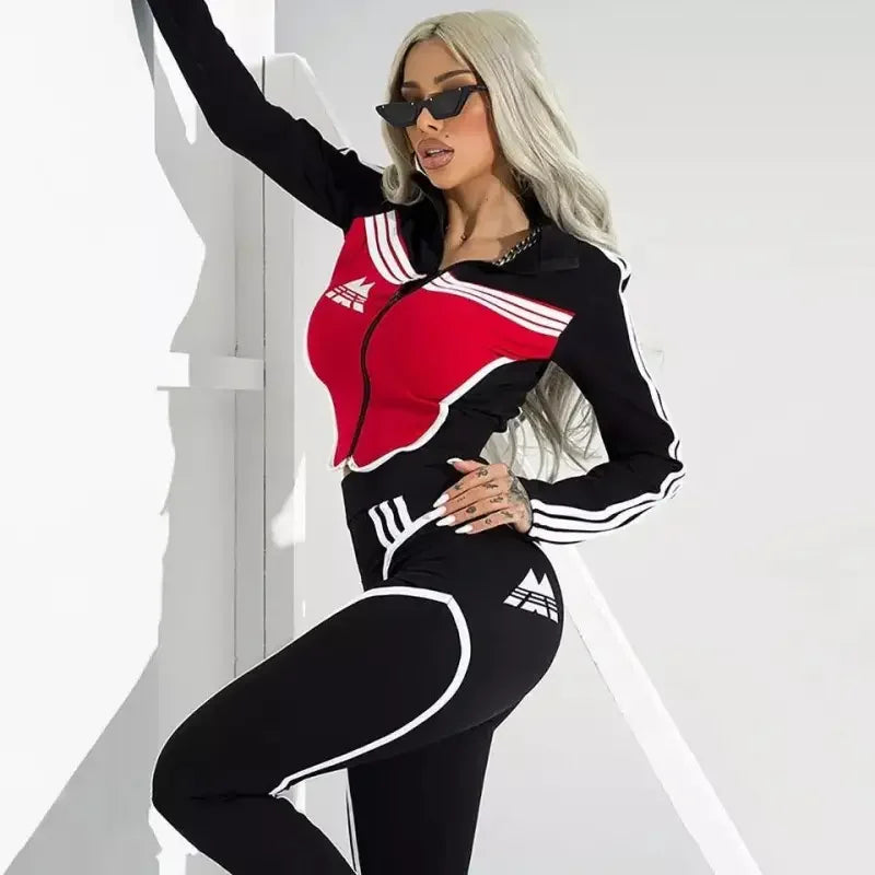 Woman in a black and red Adidas tracksuit top with women pants, perfect for women’s fashion at an online boutique