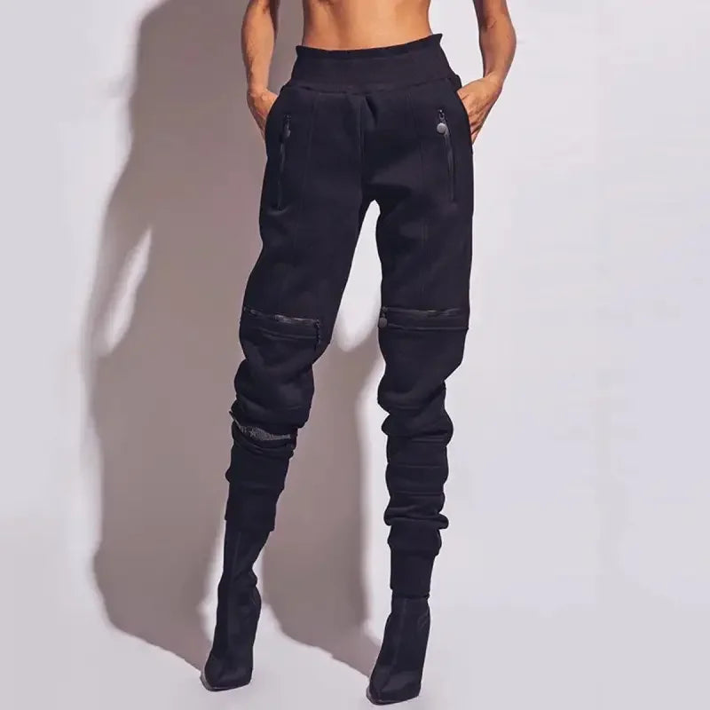 Black high-waisted casual fitness pants with attached boots showcasing style and comfort