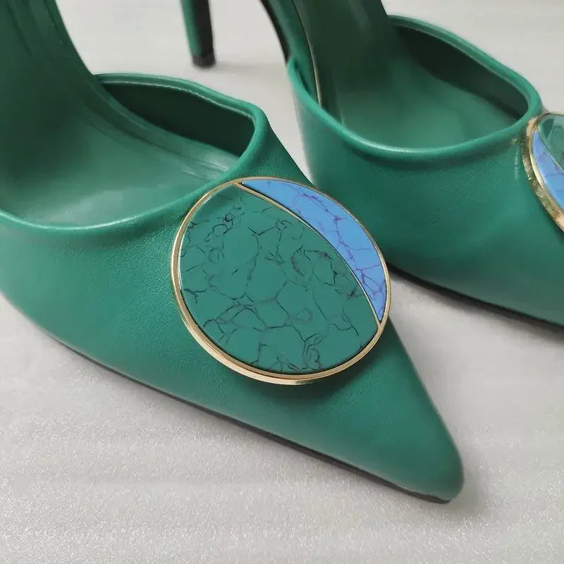Green high-heeled shoes with circular embellishments showcasing the New Design Pointed Toe style