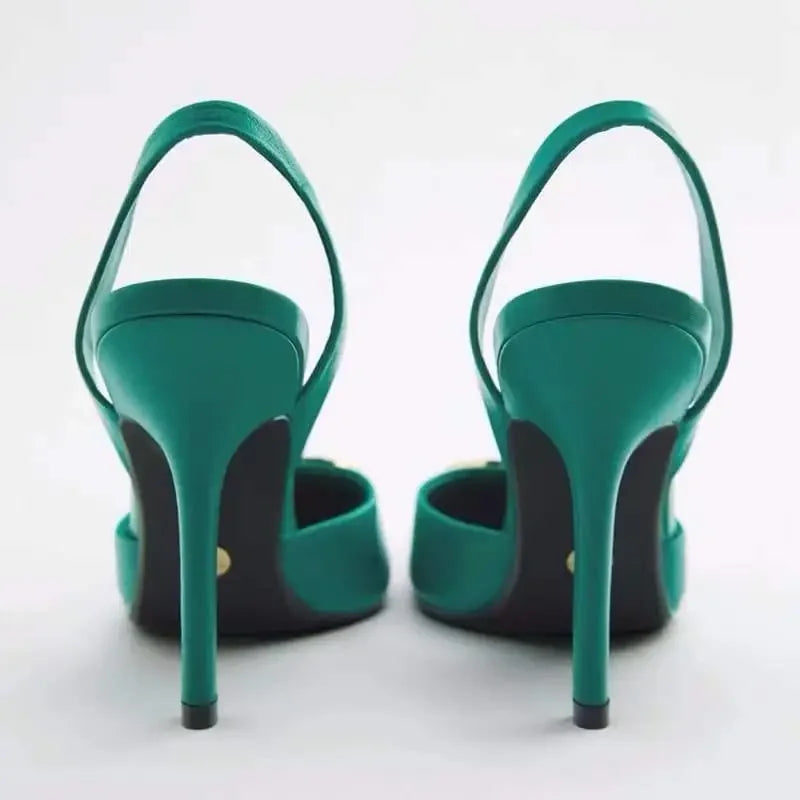 Emerald green slingback heels featuring a new design pointed toe showcasing elegance