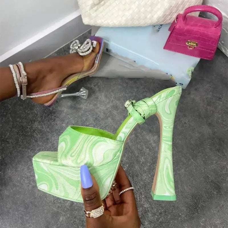 High-heeled platform shoes with ankle buckle strap and open toe design