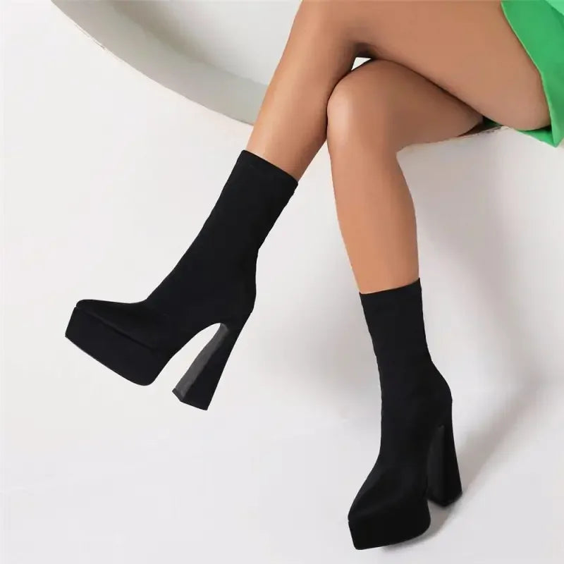 Luxury sock platform boots featuring sleek black platform sock boots design