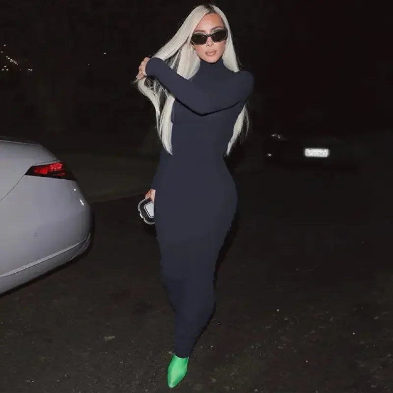 Kim Kardashian’s form-fitting black turtleneck dress from online boutique women’s fashion