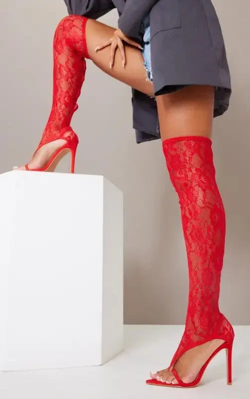 Red lace thigh-high heels from Over the Knee Lace Gladiator Boots collection showcasing stylish gladiator boots