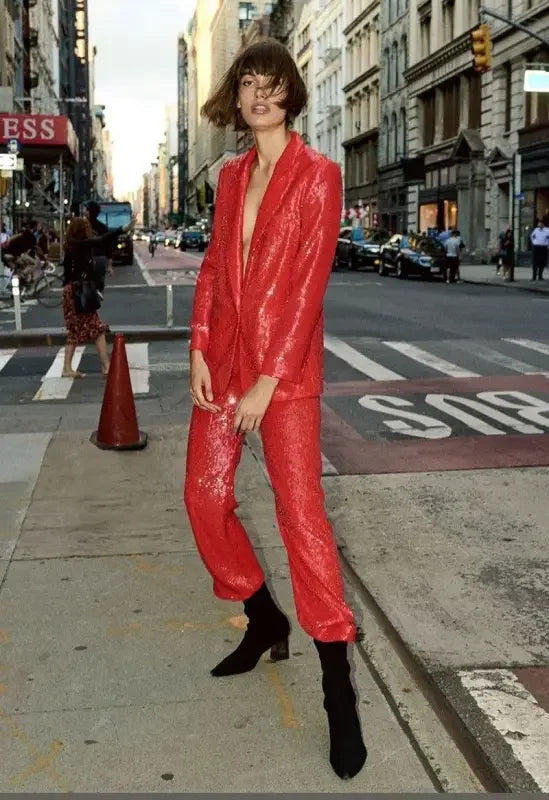 Red sequined pantsuit featuring a fashion sequin blazer and straight trousers for stylish looks