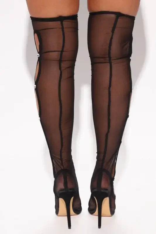 Black sheer thigh-high stiletto boots, fashion runway over-the-knee style for elegance