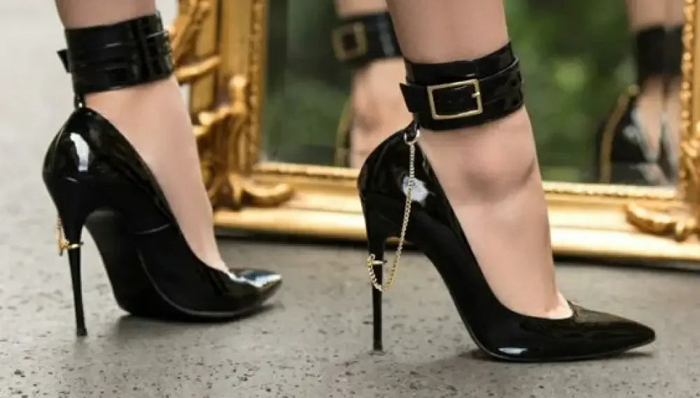 Black patent leather high heels with ankle straps from Luxury Stiletto with Chain, perfect for women’s fashion