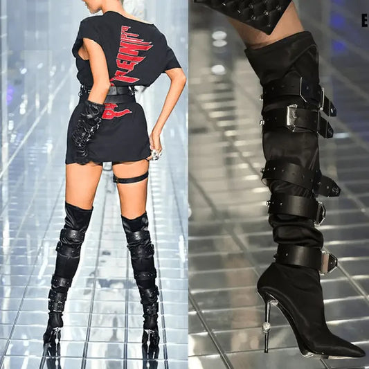 Black thigh-high buckle boots featuring belt embellishments from Belt Embellished Runway Boots