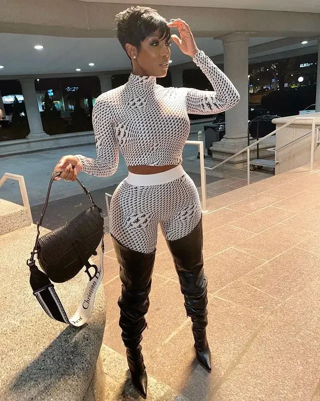 Woman modeling Catwalk Boots Spring Long Boots in patterned crop top and thigh-high style