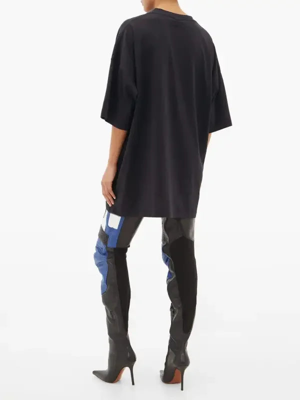 Black oversized t-shirt with patchwork thigh-high catwalk boots for spring long boots style