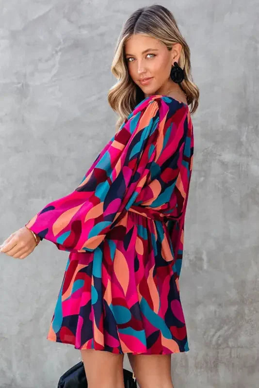 Colorful belted puff sleeve mini dress with red abstract printed pattern