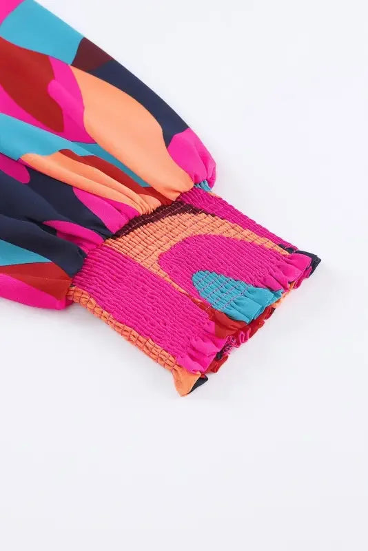 Colorful patterned belted puff sleeve mini dress with elastic cuff and red abstract print