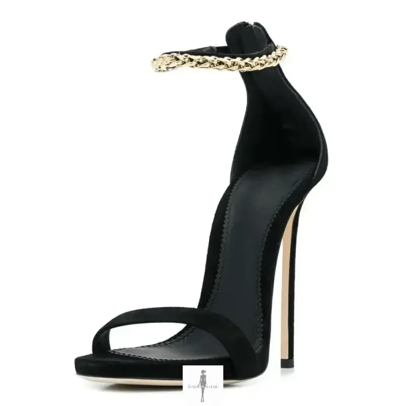 Elegant high heels: black stiletto sandal with gold ankle strap for stylish parties