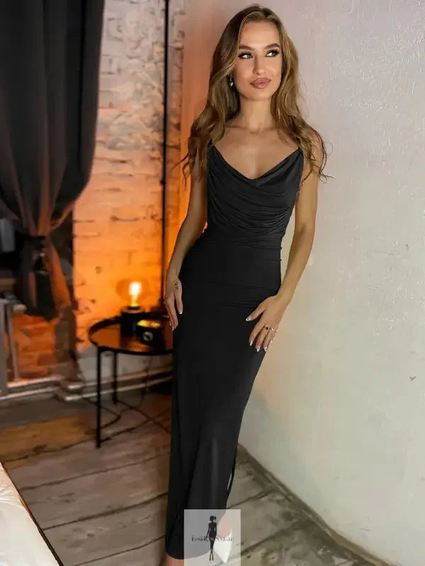 Elegant black backless cowl neck sleeveless cami dress displayed in a sophisticated gown