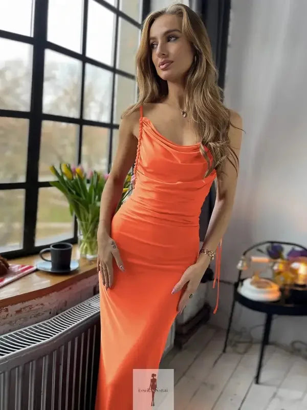 Orange sleeveless cami dress with backless cowl neck design for elegant style