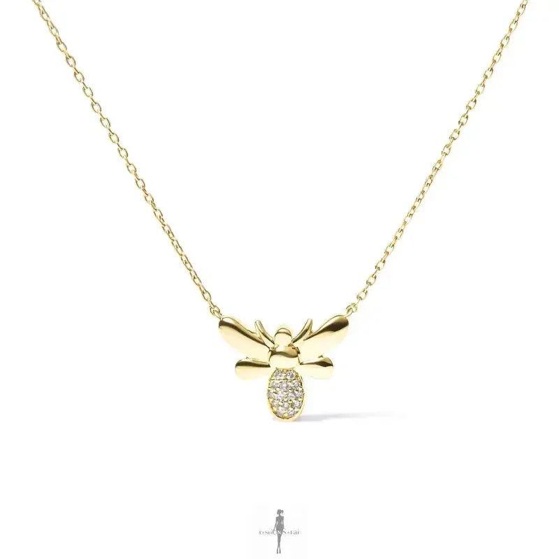 Gold bee pendant necklace perfect for summer outfits and fashionable dresses