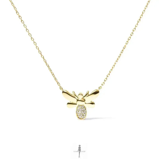 Gold bee pendant necklace perfect for summer outfits and fashionable dresses