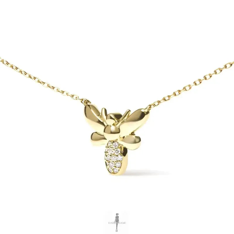 Gold bee pendant necklace ideal for summer outfits and dresses in fashionable jewelry style