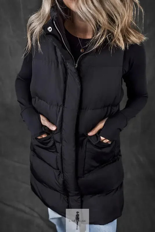 Black windproof vest with pockets, stylish black puffer vest for cold weather protection