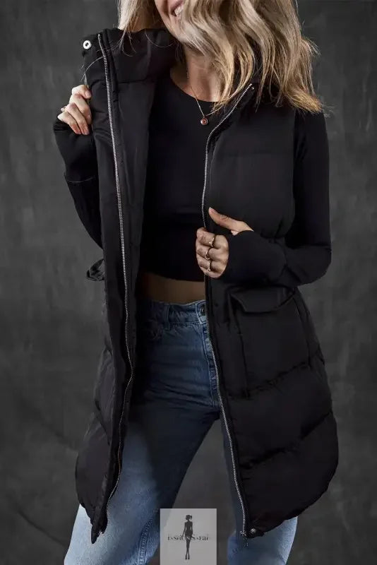 Woman modeling black windproof vest with pockets, stylish black windproof vest for outdoors