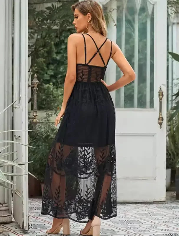 Black lace crisscross maxi dress featuring intricate detailing and elegant design