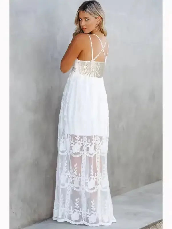 White lace crisscross maxi dress showcasing elegant design and intricate details