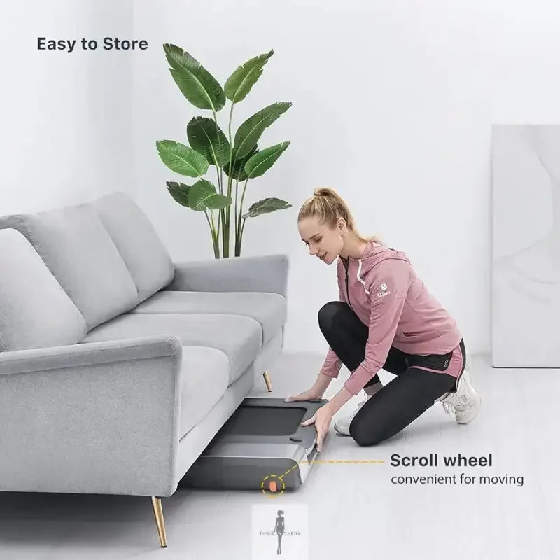 Compact walkingpad foldable treadmill stored under a sofa for space-saving convenience