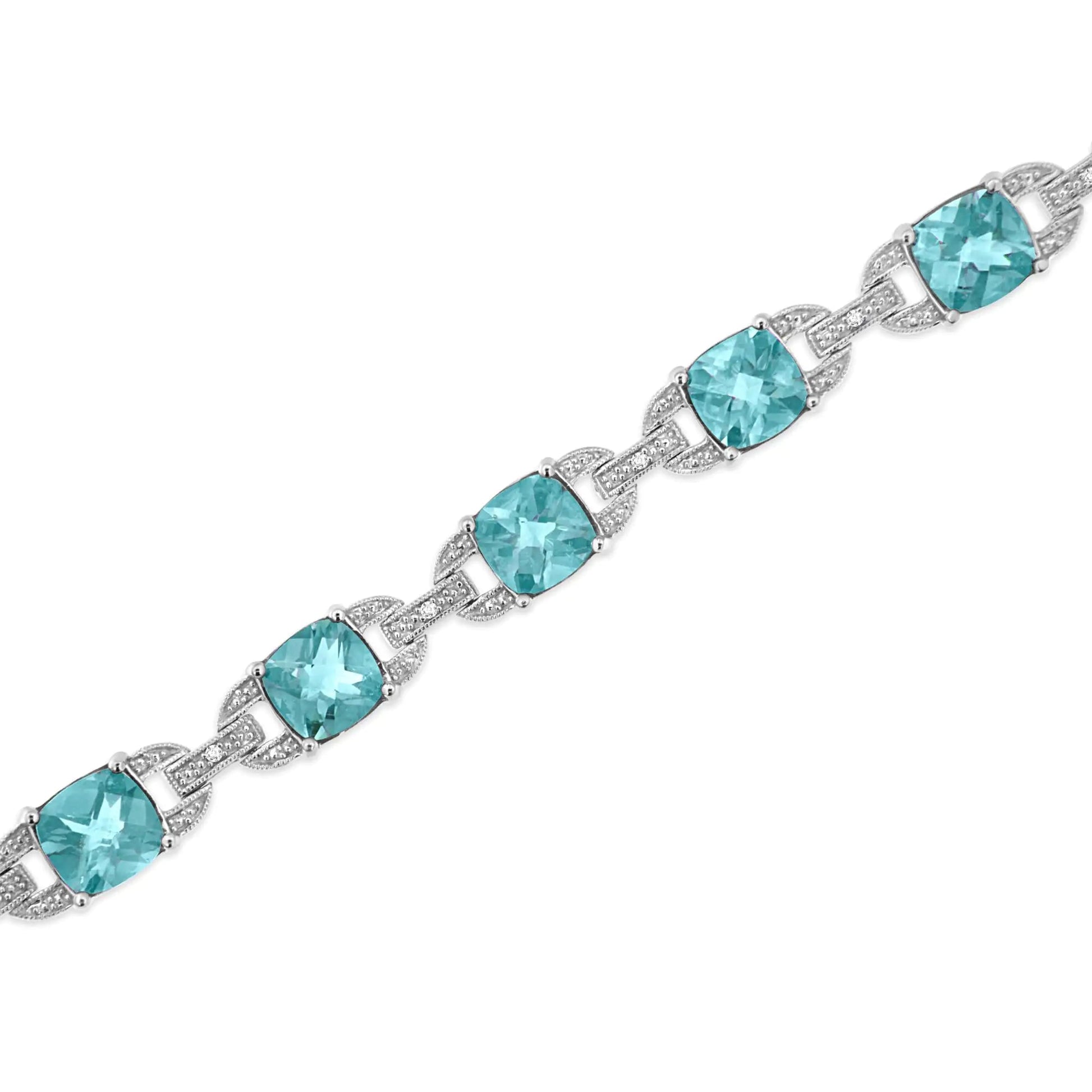 .925 Sterling Silver 7x7 mm Cushion Cut Blue Topaz and 1/20 cttw Round Cut Diamond Fashion Tennis Bracelet (I-J Color, I1-I2 Clarity) - 7" | Fashionsarah.com