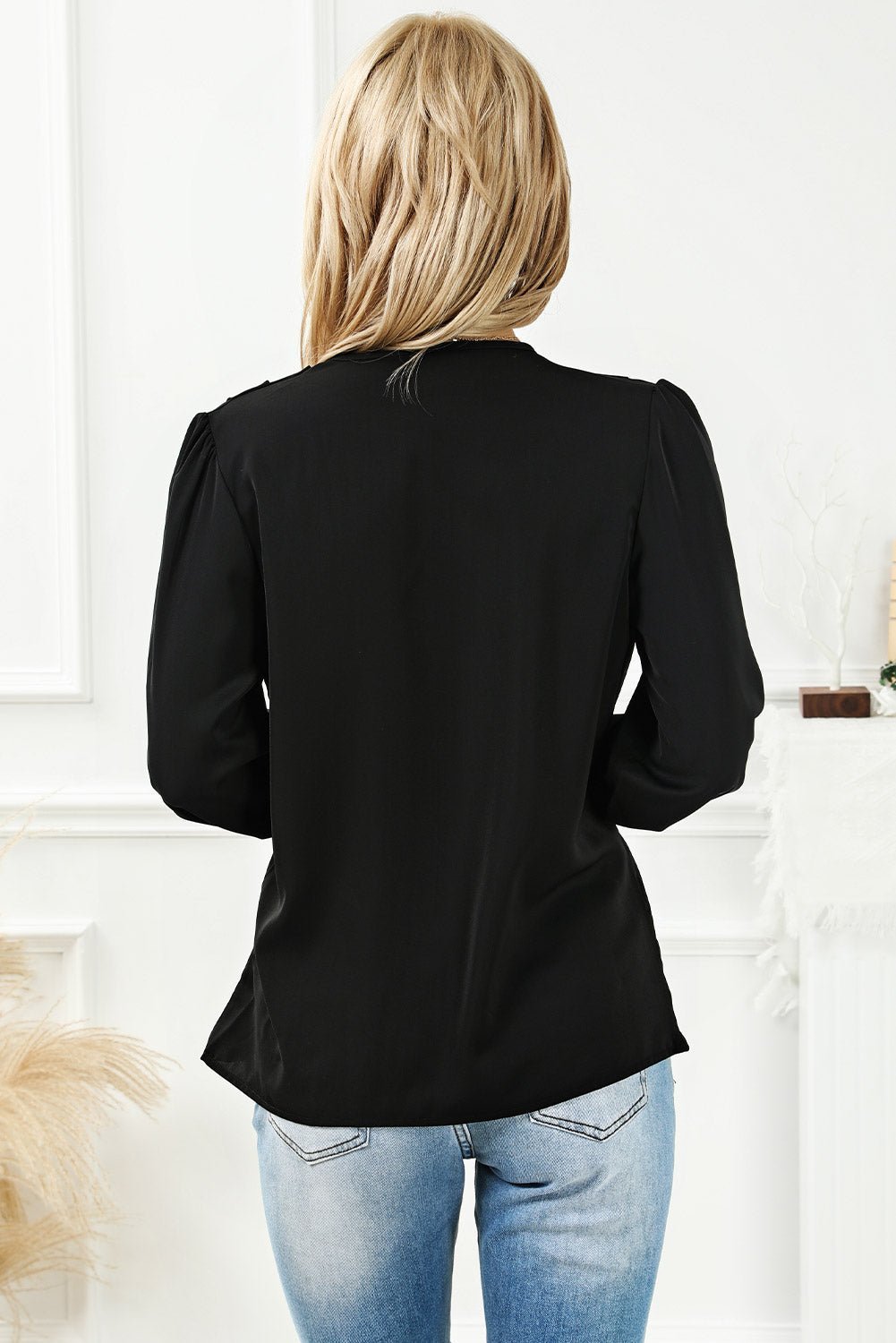 Black Solid Surplice Neck Shirred Cuffs Draped Blouse | Fashionsarah.com